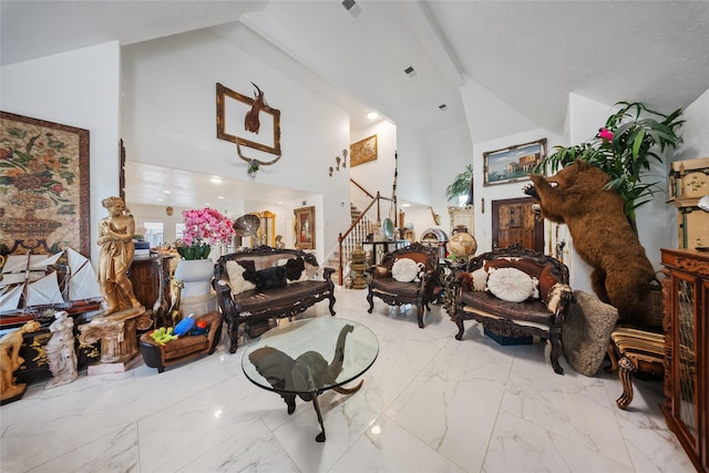 10135 Wayward Wind Ln, Houston, TX 77064 - living room featuring stairs, marble finish flooring, and high vaulted ceiling