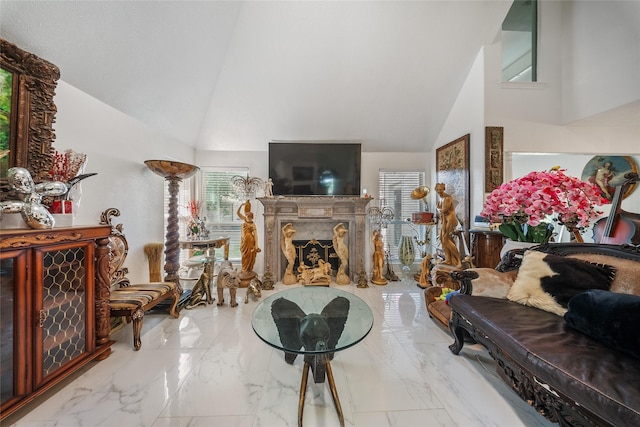 10135 Wayward Wind Ln, Houston, TX 77064 - living room featuring a high end fireplace, high vaulted ceiling, and marble finish flooring