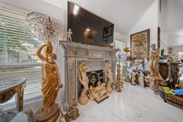 10135 Wayward Wind Ln, Houston, TX 77064 - living area with a fireplace, vaulted ceiling, and marble finish floors
