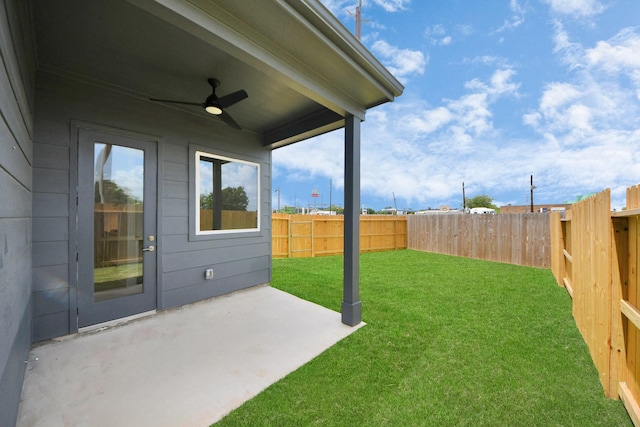 3003A Ventas Dr, Houston, TX 77047 - fenced backyard featuring a ceiling fan and a patio area