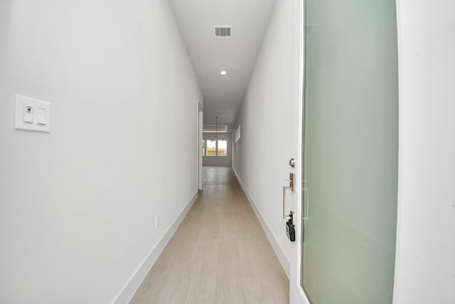 3003A Ventas Dr, Houston, TX 77047 - hallway featuring baseboards and recessed lighting