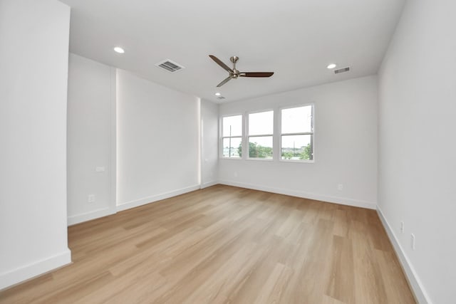 3003A Ventas Dr, Houston, TX 77047 - spare room with light wood-type flooring, ceiling fan, and recessed lighting