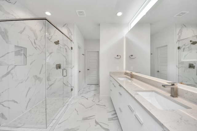 3003A Ventas Dr, Houston, TX 77047 - full bath with double vanity, a marble finish shower, marble finish flooring, and recessed lighting