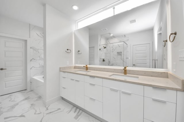 3003A Ventas Dr, Houston, TX 77047 - full bathroom featuring a marble finish shower, marble look tile flooring, double vanity, a tub to relax in, and recessed lighting