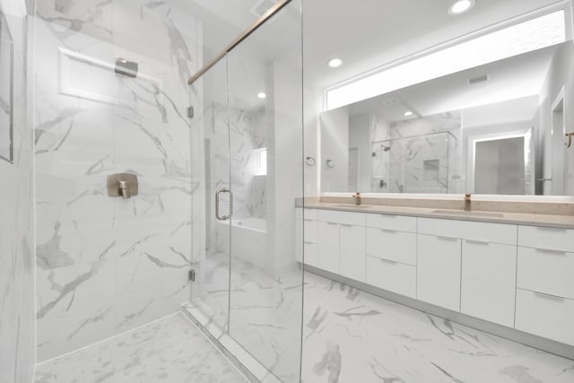 3003A Ventas Dr, Houston, TX 77047 - bathroom with marble finish flooring, double vanity, a marble finish shower, and recessed lighting
