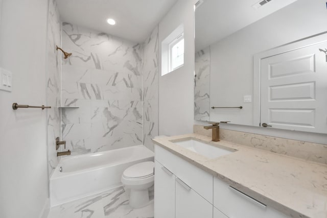 3003A Ventas Dr, Houston, TX 77047 - full bathroom with vanity, shower / bathtub combination, and marble look tiles