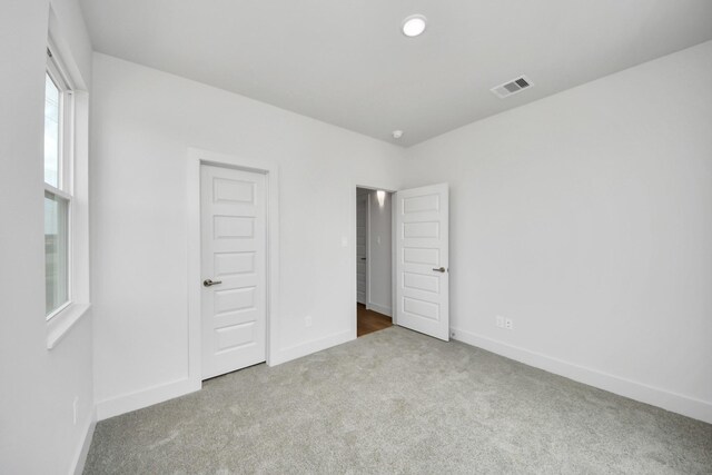 3003A Ventas Dr, Houston, TX 77047 - unfurnished bedroom featuring carpet floors and baseboards