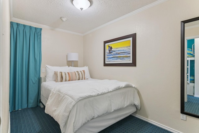 6102 Seawall Blvd Unit 105, Galveston, TX 77551 - carpeted bedroom with crown molding and a textured ceiling