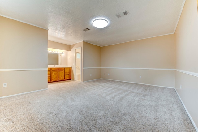 22619 Rockgate Dr, Spring, TX 77373 - spare room with a textured ceiling and light colored carpet