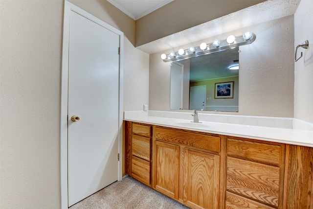 22619 Rockgate Dr, Spring, TX 77373 - bathroom featuring vanity and ornamental molding