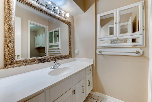 22619 Rockgate Dr, Spring, TX 77373 - bathroom with vanity and tile patterned flooring