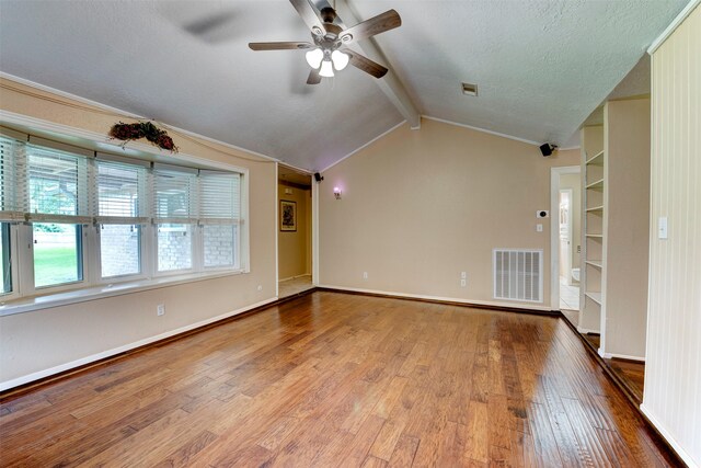 22619 Rockgate Dr, Spring, TX 77373 - spare room featuring wood finished floors, ceiling fan, and a textured ceiling