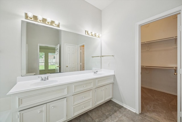 8211 Broken Timber Way, Houston, TX 77095 - full bathroom with double vanity and a spacious closet