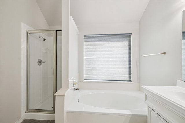 8211 Broken Timber Way, Houston, TX 77095 - full bathroom with a stall shower, a garden tub, and vanity