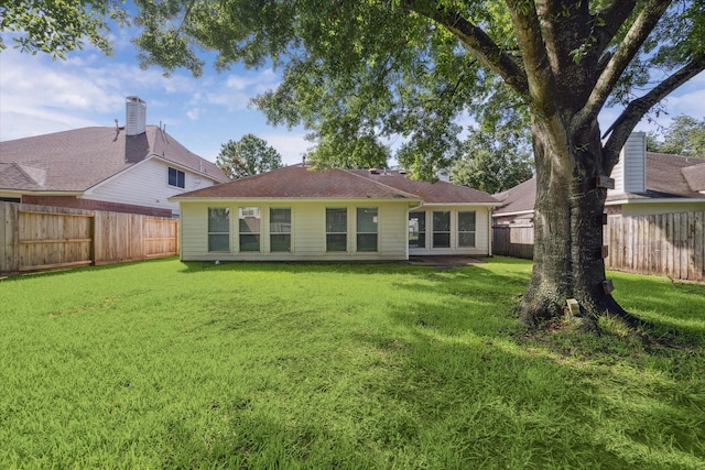 8211 Broken Timber Way, Houston, TX 77095 - rear view of house with a fenced backyard