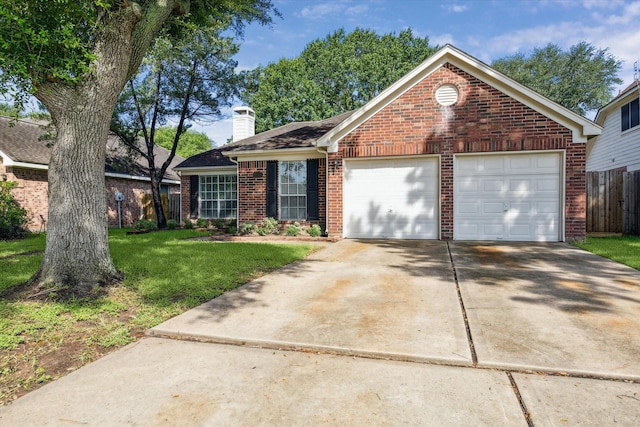 8211 Broken Timber Way, Houston, TX 77095 - view of front facade with brick siding, a chimney, driveway, and an attached garage