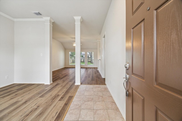 8211 Broken Timber Way, Houston, TX 77095 - foyer entrance featuring a ceiling fan, light wood finished floors, and ornate columns