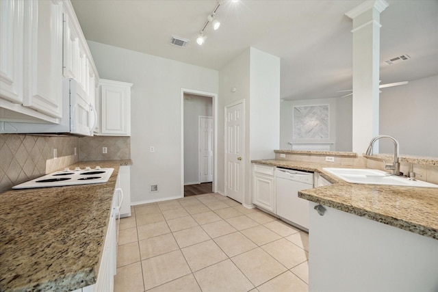 8211 Broken Timber Way, Houston, TX 77095 - kitchen featuring white appliances, light tile patterned floors, tasteful backsplash, white cabinets, and light stone counters