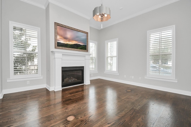206 Green Blvd, Shenandoah, TX 77384 - unfurnished living room with crown molding, healthy amount of natural light, and wood finished floors