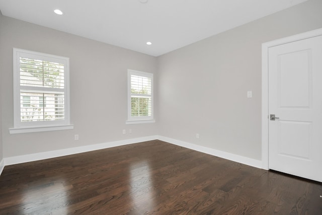 206 Green Blvd, Shenandoah, TX 77384 - empty room with dark wood-style flooring and recessed lighting