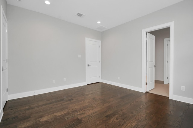 206 Green Blvd, Shenandoah, TX 77384 - empty room with wood finished floors and recessed lighting