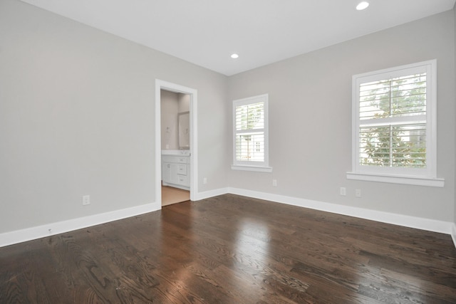 206 Green Blvd, Shenandoah, TX 77384 - empty room with wood finished floors and recessed lighting