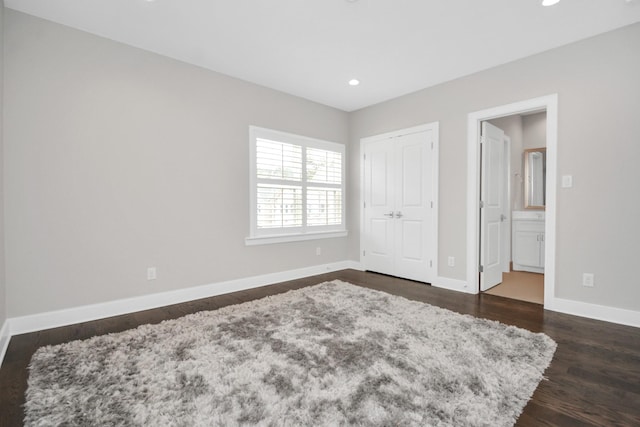 206 Green Blvd, Shenandoah, TX 77384 - bedroom featuring dark wood finished floors, recessed lighting, connected bathroom, and a closet