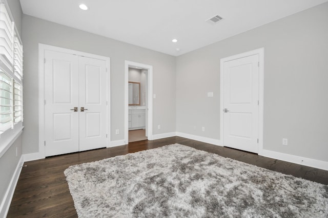 206 Green Blvd, Shenandoah, TX 77384 - bedroom with dark wood finished floors, recessed lighting, connected bathroom, and a closet