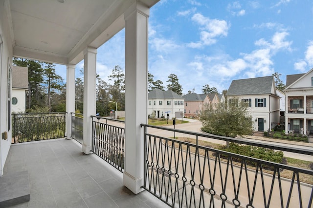 206 Green Blvd, Shenandoah, TX 77384 - covered porch with a residential view