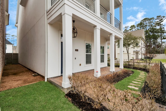 206 Green Blvd, Shenandoah, TX 77384 - property entrance with a balcony and a patio