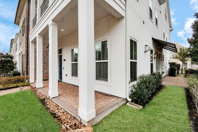206 Green Blvd, Shenandoah, TX 77384 - view of property exterior featuring stucco siding