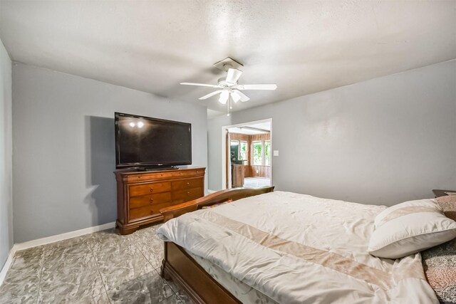 10806 Sagegulf Ln, Houston, TX 77089 - bedroom featuring marble finish flooring and a ceiling fan