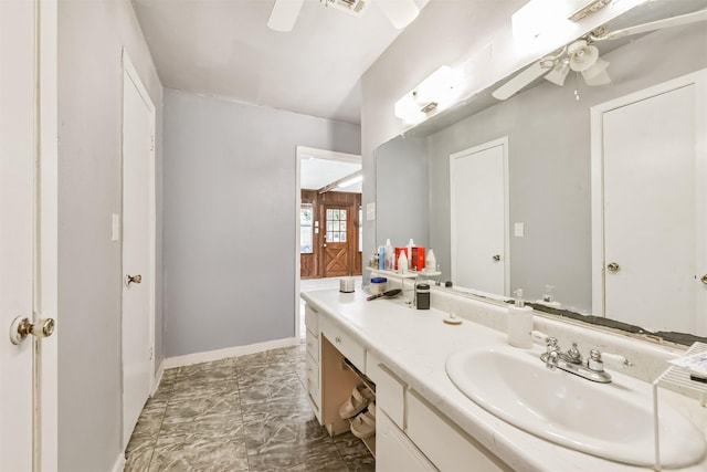 10806 Sagegulf Ln, Houston, TX 77089 - bathroom with ceiling fan, vanity, and marble finish floors