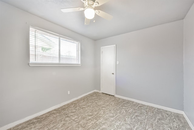 10806 Sagegulf Ln, Houston, TX 77089 - empty room featuring a ceiling fan and baseboards