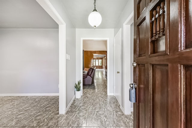 10806 Sagegulf Ln, Houston, TX 77089 - corridor with baseboards and light marble finish floors