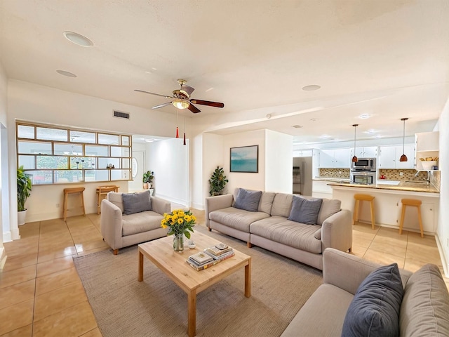 7123 Galleon Dr, Houston, TX 77036 - living room featuring light tile patterned floors and ceiling fan