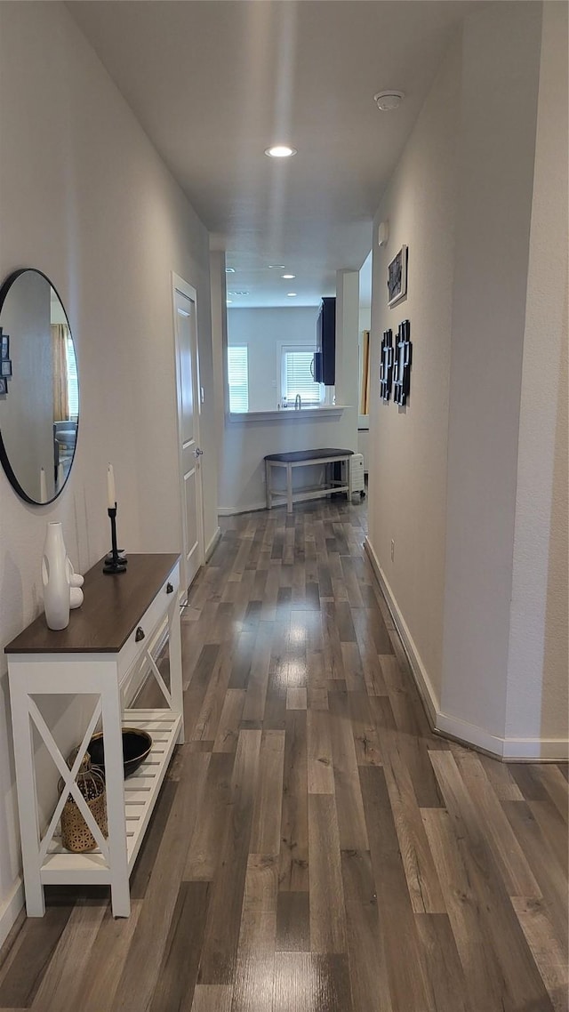21319 Indigo Ruth Dr, Spring, TX 77379 - hall with dark wood-style floors and baseboards