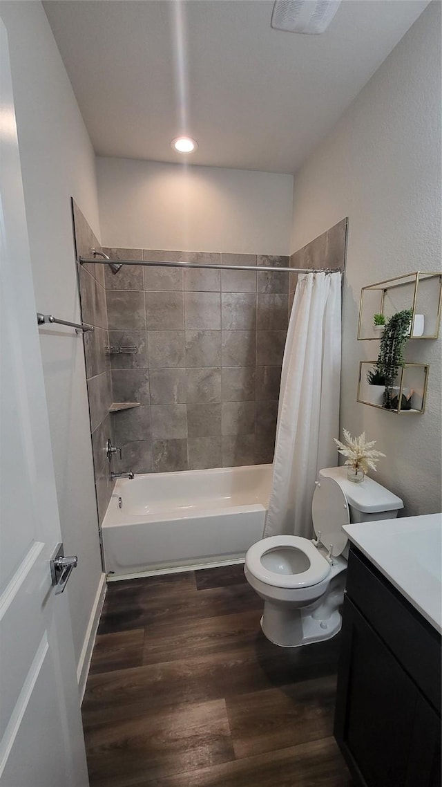 21319 Indigo Ruth Dr, Spring, TX 77379 - bathroom featuring vanity, shower / bath combination with curtain, and wood finished floors
