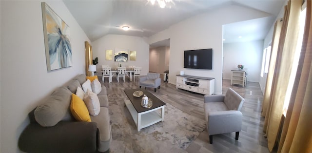 21319 Indigo Ruth Dr, Spring, TX 77379 - living area featuring vaulted ceiling and wood finished floors