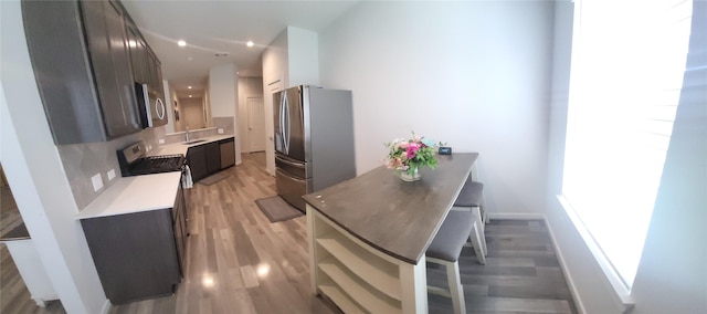 21319 Indigo Ruth Dr, Spring, TX 77379 - dining space with light wood-style flooring and recessed lighting