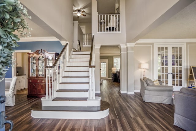 20919 Autumn Redwood Way, Cypress, TX 77433 - staircase with a high ceiling, french doors, ceiling fan, wood finished floors, and crown molding
