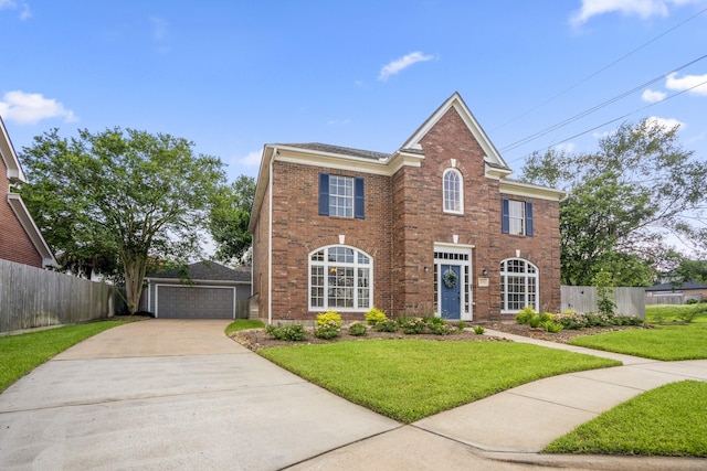 20919 Autumn Redwood Way, Cypress, TX 77433 - georgian-style home with brick siding and a garage