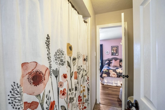 20919 Autumn Redwood Way, Cypress, TX 77433 - ensuite bathroom with tile patterned floors and curtained shower