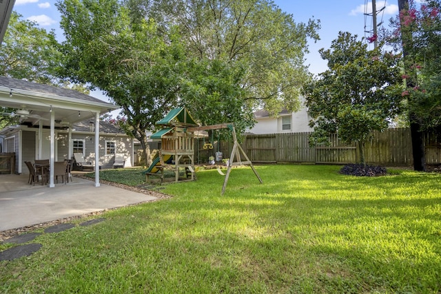 20919 Autumn Redwood Way, Cypress, TX 77433 - fenced backyard featuring a playground and a patio