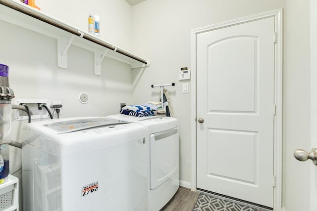 2337 Shalmar Dr, West Columbia, TX 77486 - washroom featuring independent washer and dryer and light wood-style flooring
