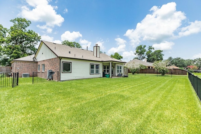 2337 Shalmar Dr, West Columbia, TX 77486 - back of property with brick siding, a fenced backyard, a chimney, and board and batten siding