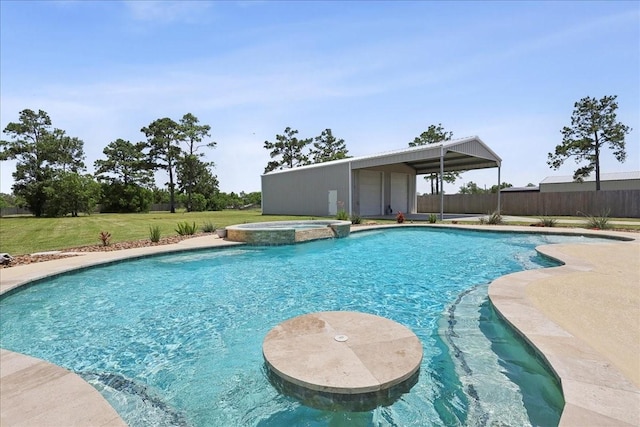 5219 Camp Creek Rd, Baytown, TX 77523 - view of swimming pool with a pool with connected hot tub and an outdoor structure