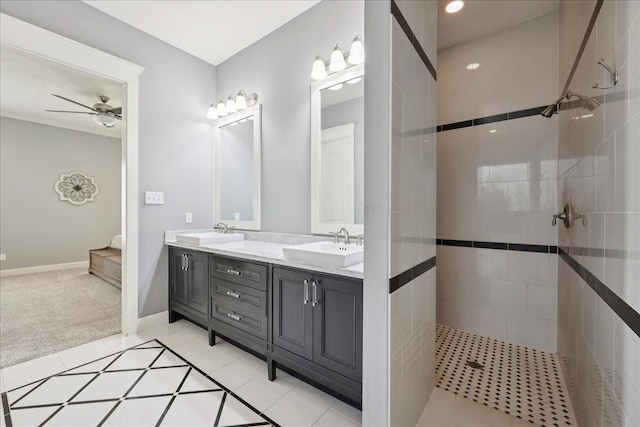5219 Camp Creek Rd, Baytown, TX 77523 - full bath featuring double vanity, a walk in shower, ceiling fan, and tile patterned flooring