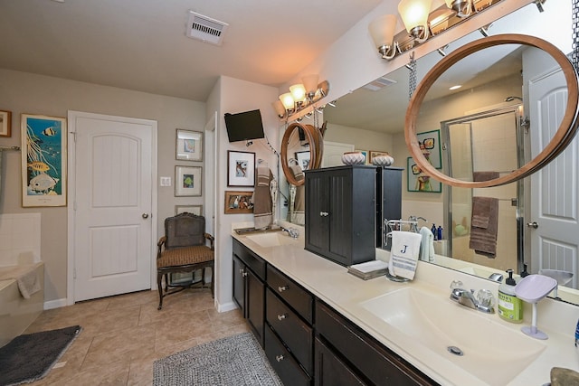 12207 Green City Ln, Houston, TX 77047 - full bathroom featuring double vanity, a tile shower, a garden tub, and tile patterned flooring