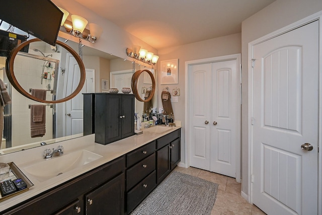 12207 Green City Ln, Houston, TX 77047 - full bathroom with double vanity and tile patterned floors